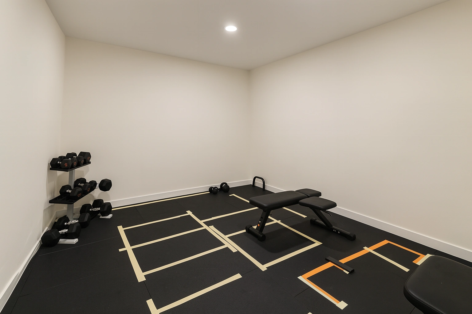 Compact home gym layout with open clearance around equipment